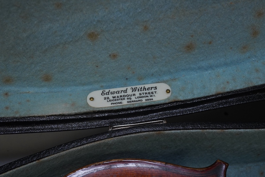 A late 19th century French Chipot-Vuillaume violin, with Edward Withers case, back measures 36cm.